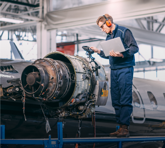 Technician working on aircraft maintenance
