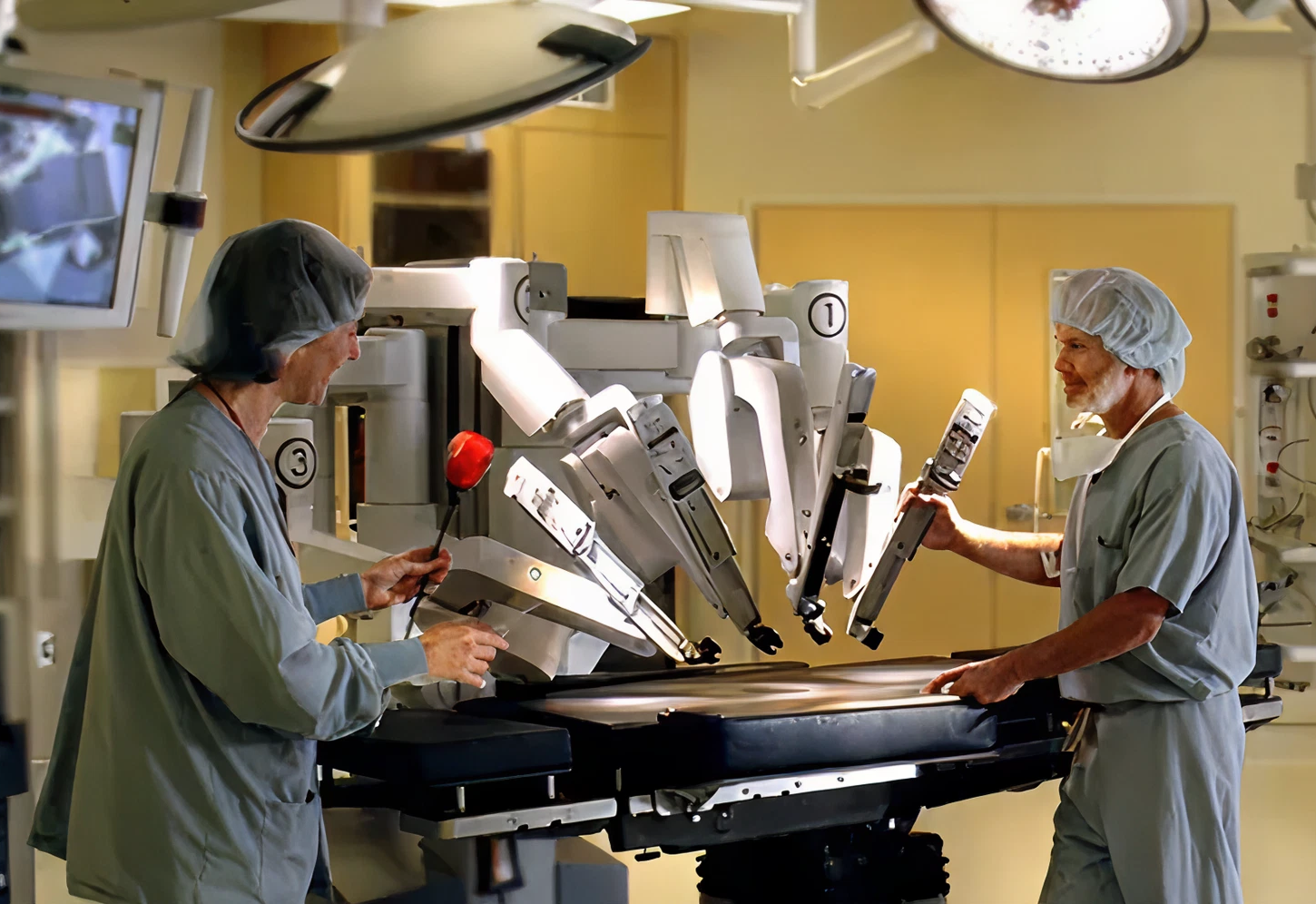 Doctors preparing robotic surgical system