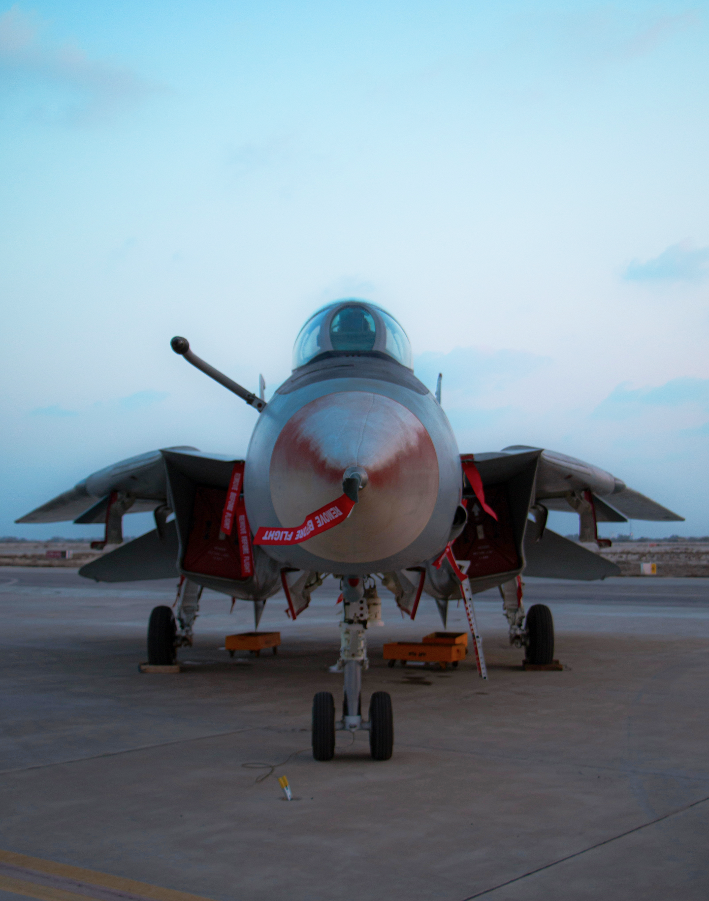 Front view of parked military jet