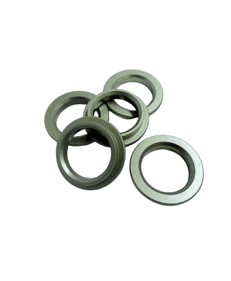 A group of metal washers of varying sizes arranged together.